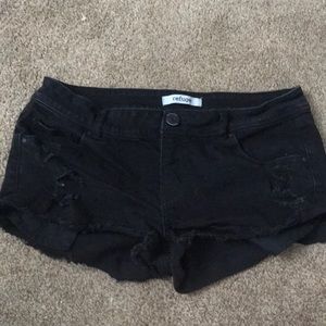 Black ripped refuge shorts